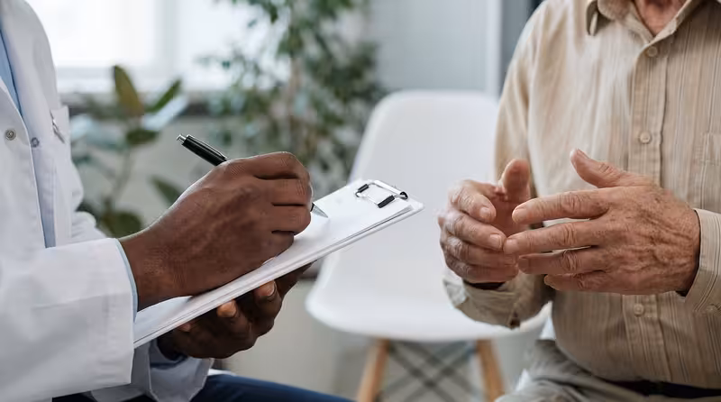 Doctor and patient consultation for Tailored Support for Blocked Ears, Hearing Concerns and Reassurance - Meet The Team At H...